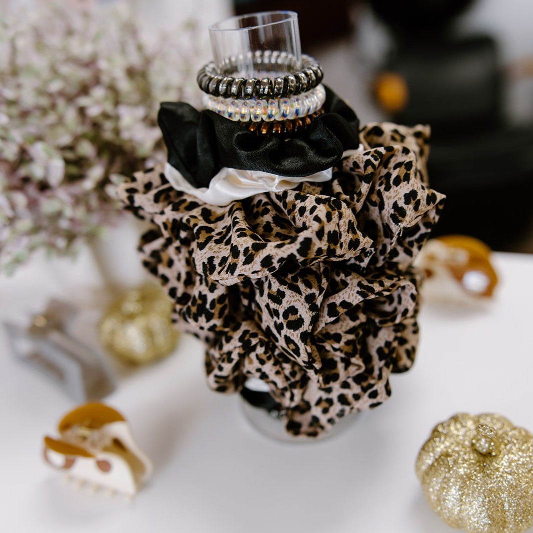 hair scrunchies next to pumpkins