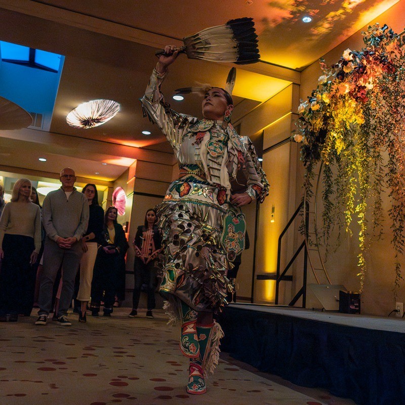Acosia Red Elk performing a jingle dance.