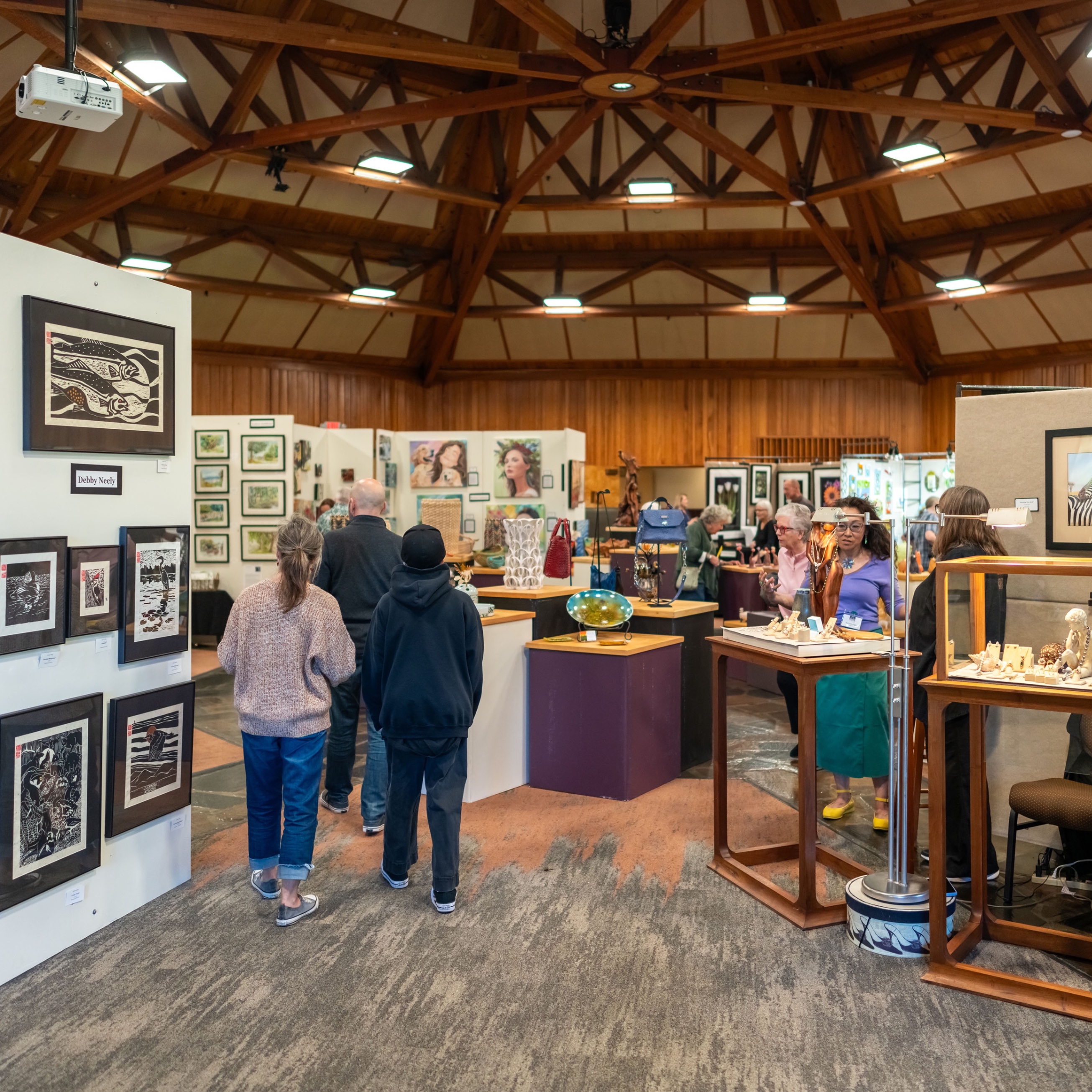 People shopping at artist booths
