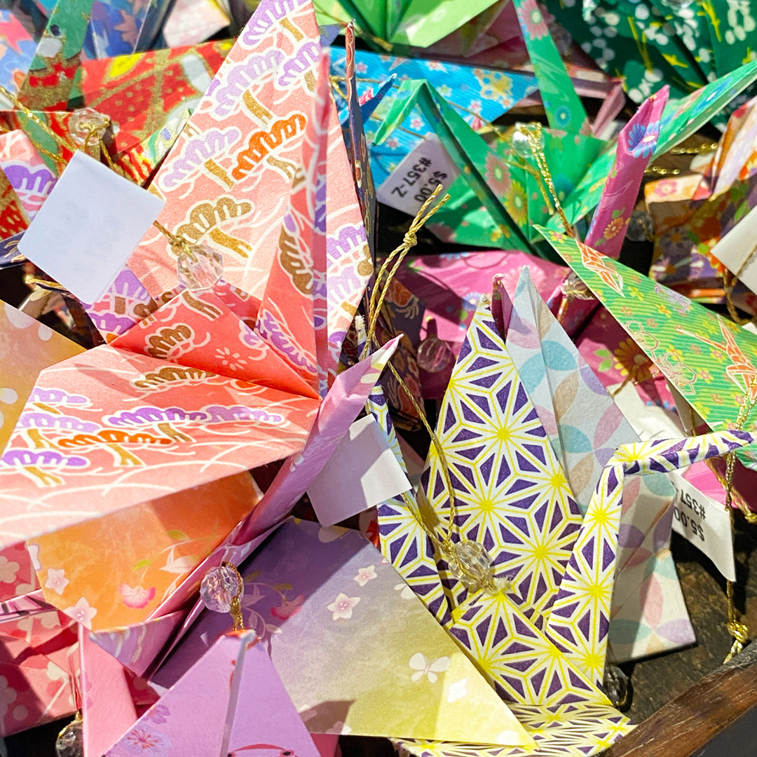 colorful folded origami cranes