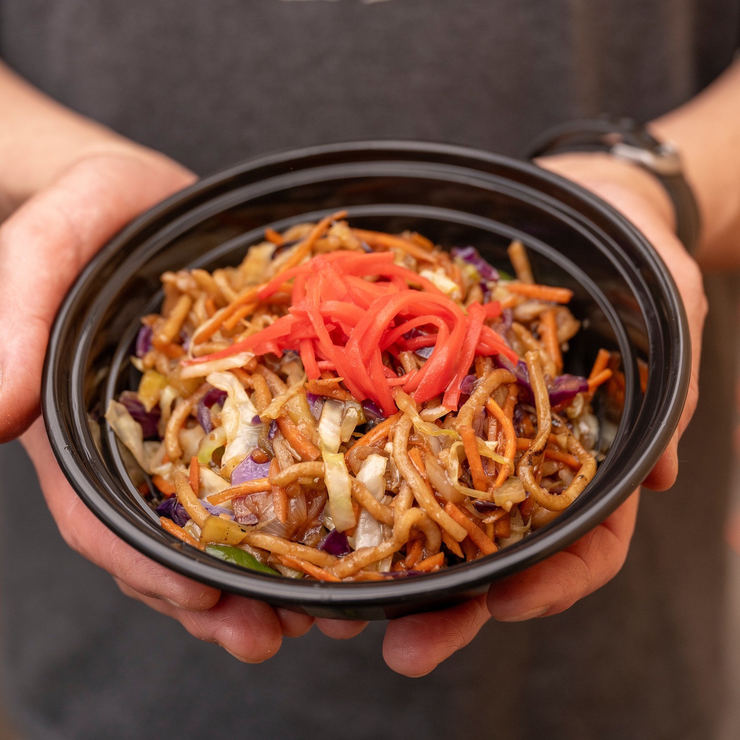 a bowl of traditional Japanese yakisoba - stir-fried noodles with vegetables.
