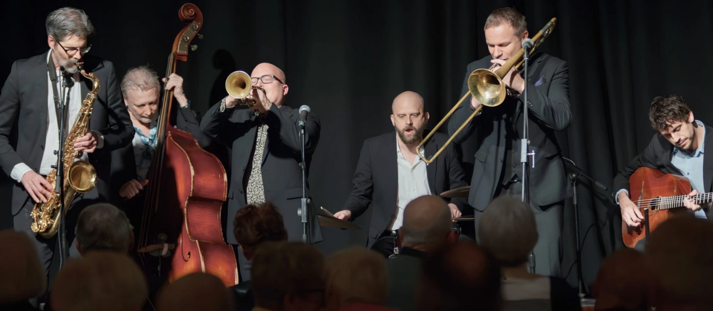 w-2544h-1111-afb0a6-Second Line Jazzband 2026.jpeg