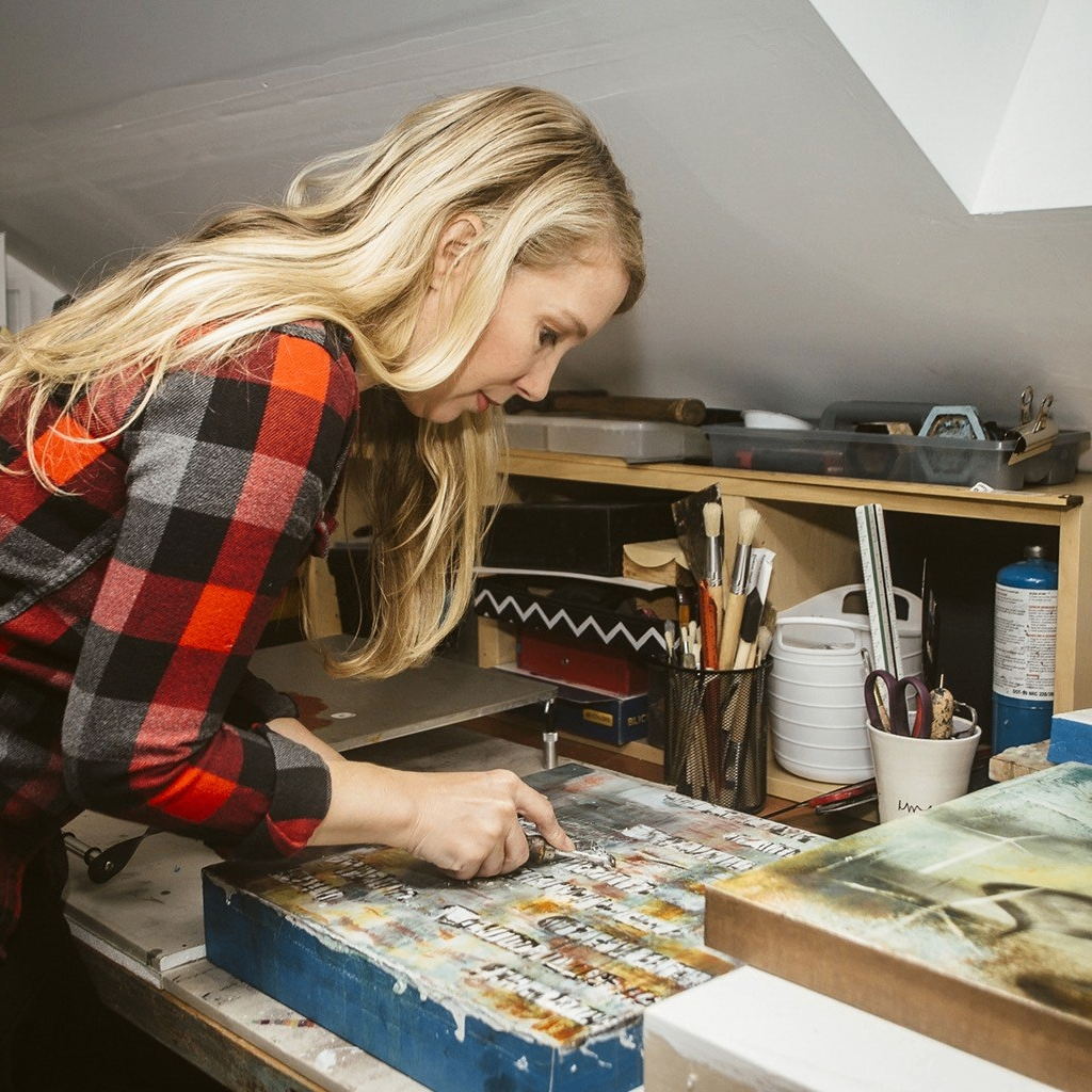 a person making art in a studio