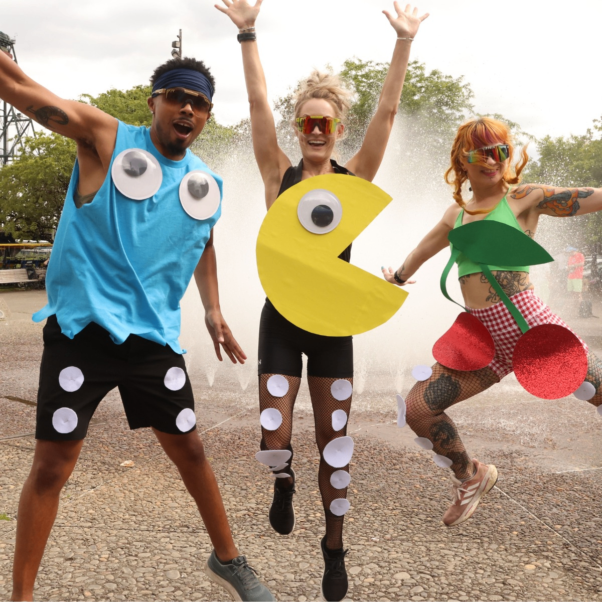 people in pac-man costumes jumping