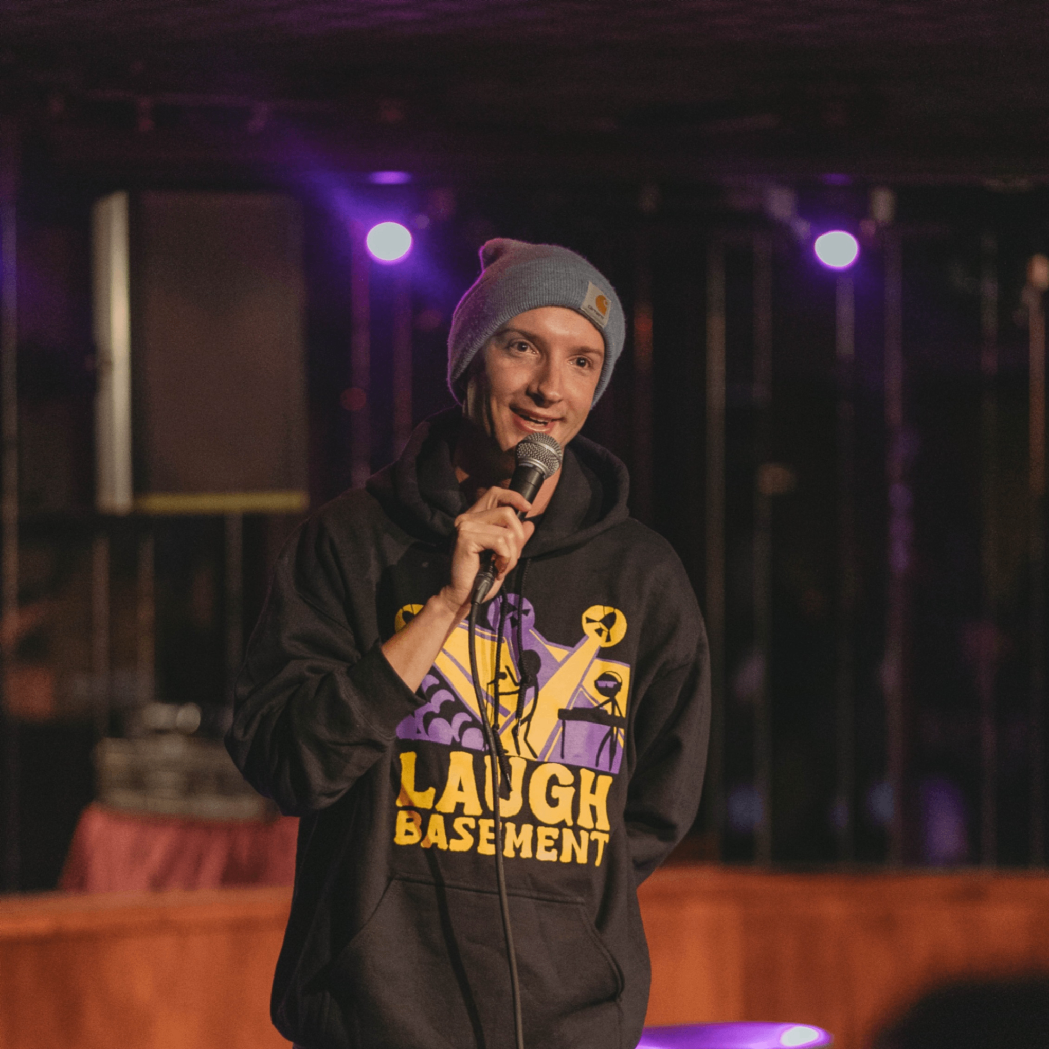 a person speaking into a microphone