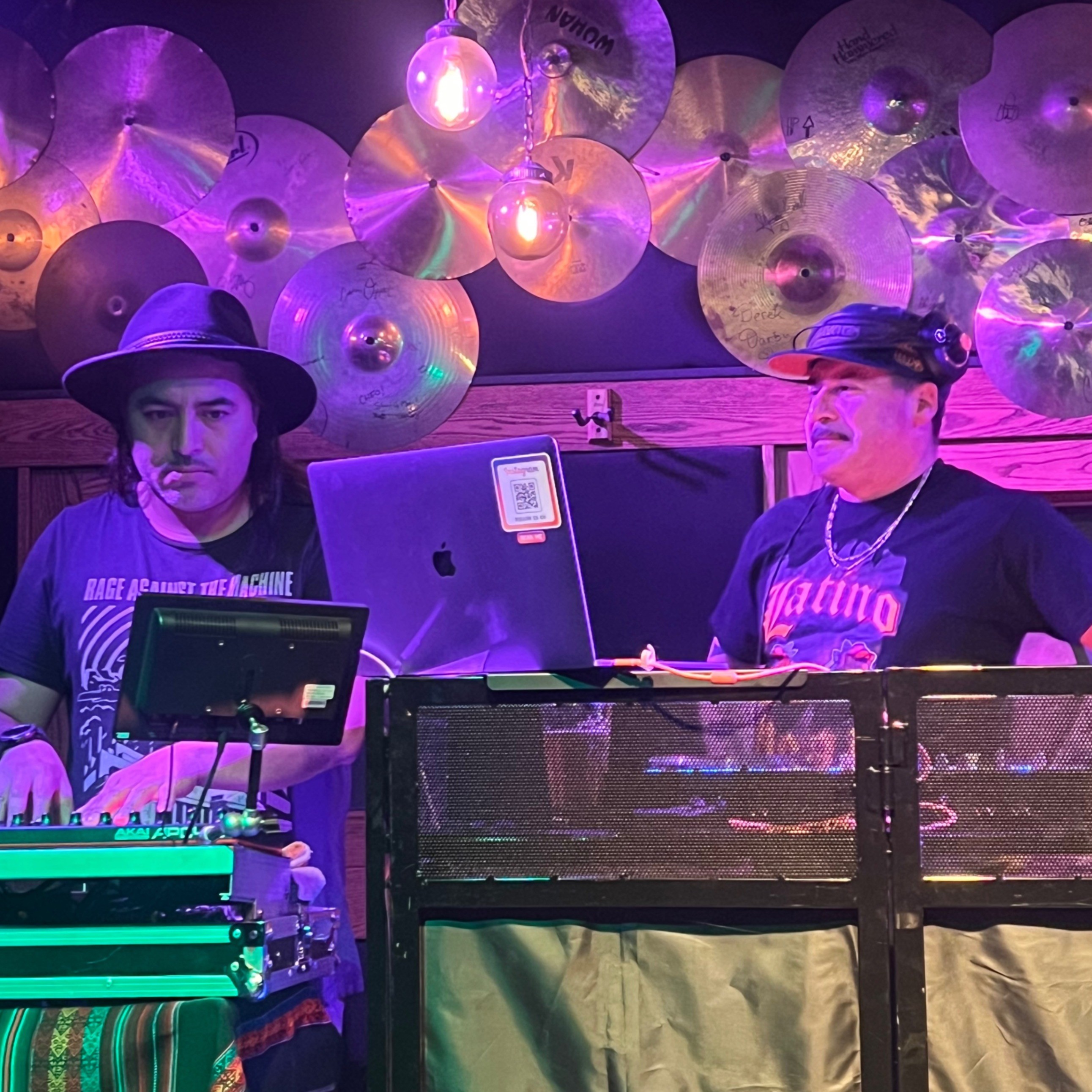 two Djs spinning records