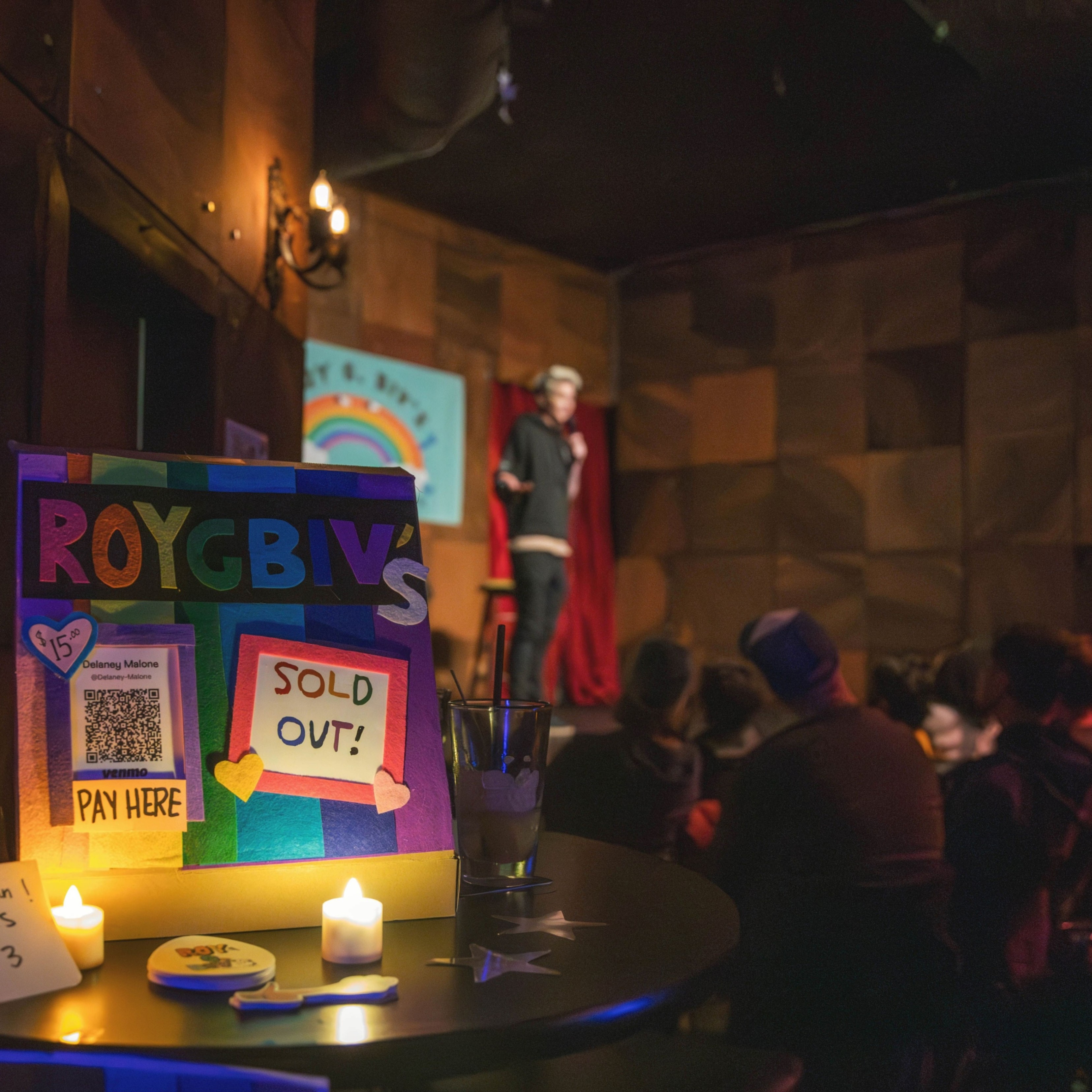 a sold out sign on an event table