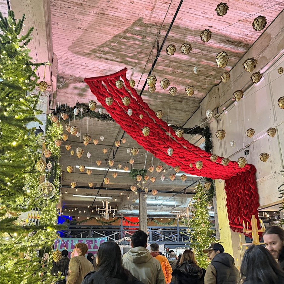 browsing people surrounded by festive holiday decorations